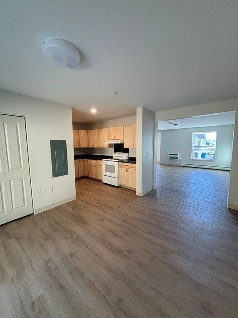 Finished open-plan kitchen and living area in a new townhouse unit